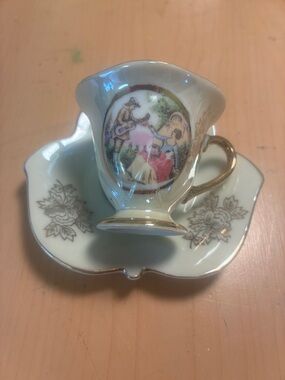 White and Gold Floral Porcelain Demitasse Cup and Saucer